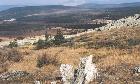 Фото 11. Вид с горы 1333 (хр. Машак) на Юрюзаньское, Сычинское Болота, гору Весёлая (пологий зелёный холм) и Бол. Шелом.