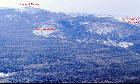 Фото 13. Вид с горы 1317 (хр. Кумардак) на Юрюзаньскую Долину и хр. Машак в районе горы Широкий Машак.